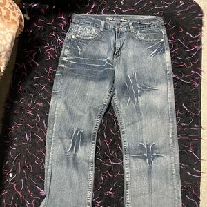 Distressed Blue Jeans